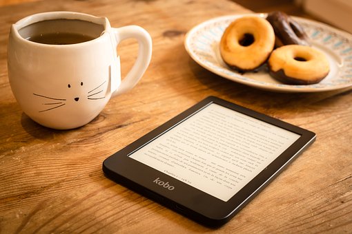 E-Reader with Donuts and Coffee